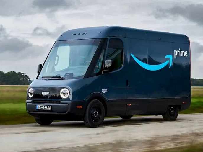 Rivian electric delivery van parked at a production facility