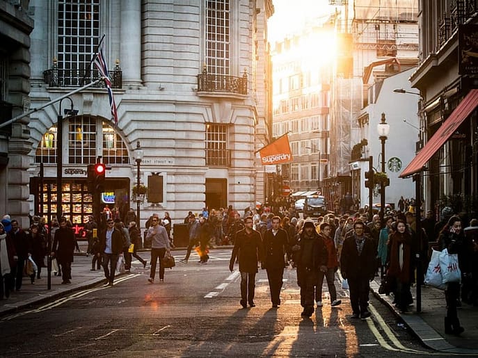 A crowded street in the UK, representing population growth driven by immigration